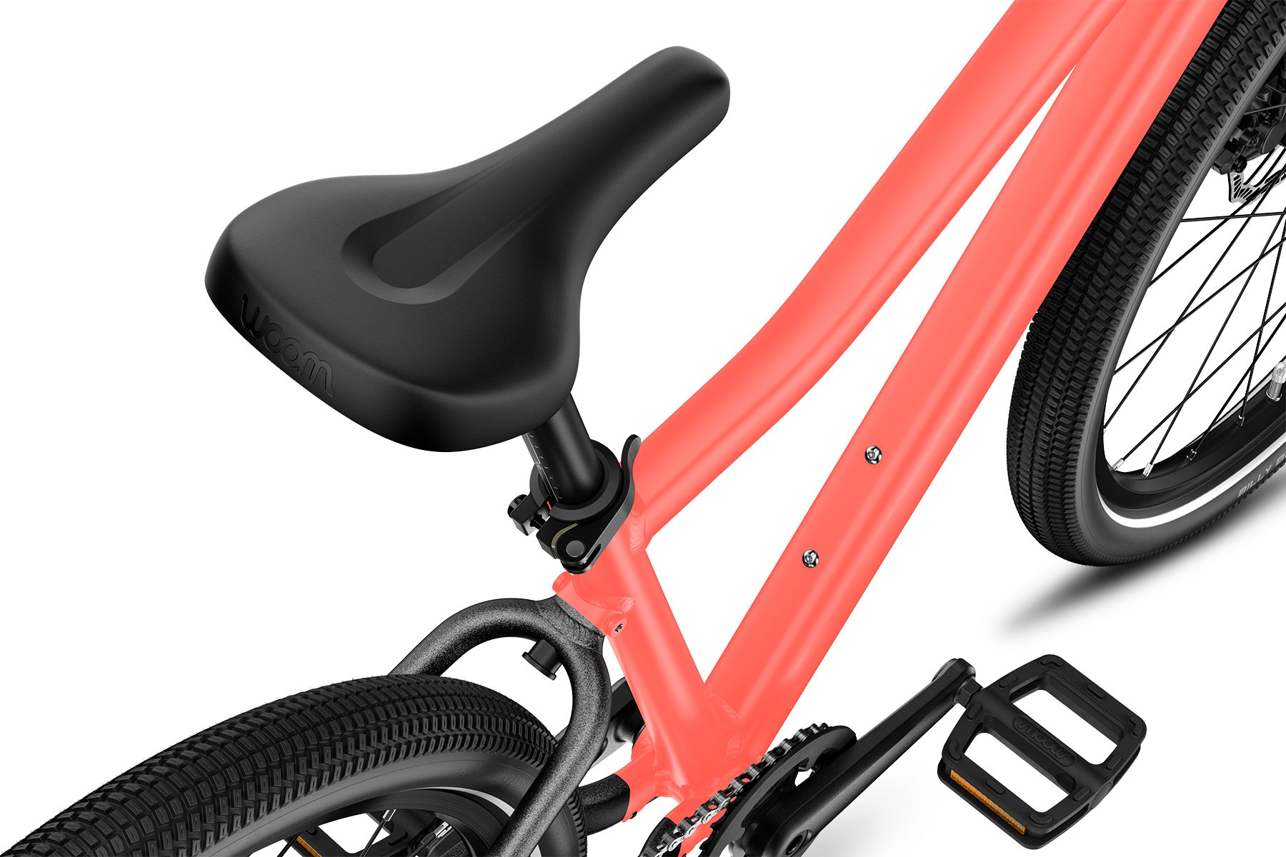 Brotorvets Cykler_Næstved_Sydsjælland_woom_EXPLORE_Saddle-View_neon-coral_Detail_2024.jpg